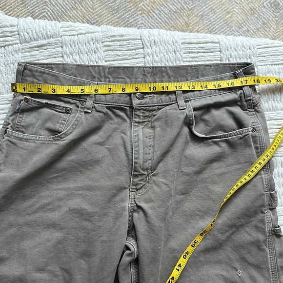 Carhartt distressed carpenter pants with some stains and holes. #10015 - Picture 10 of 11